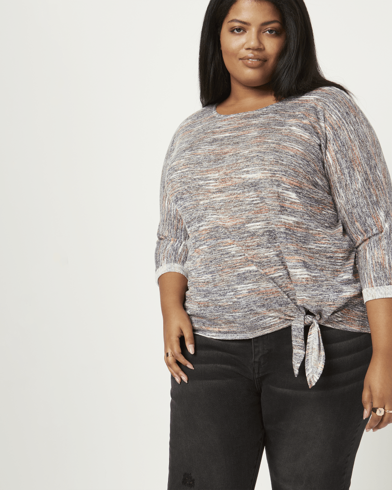 Front of a model wearing a size 1X Caty Side Tie Dolman Sleeve Top in Cool Gray / Pink by Bobeau. | dia_product_style_image_id:210525